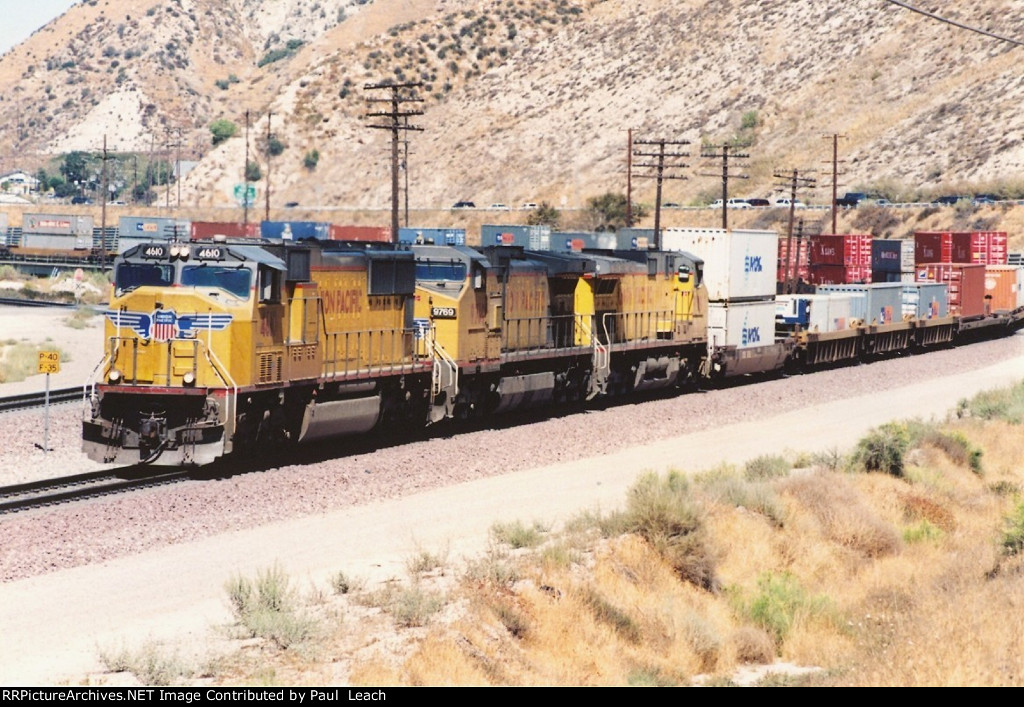 Stack train eases west down the grade